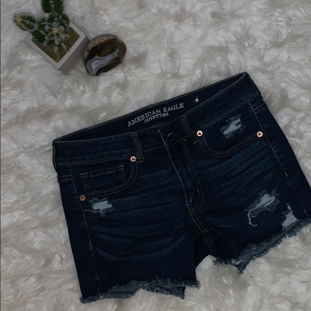 Dark blue, longer inseam jean shorts AEO